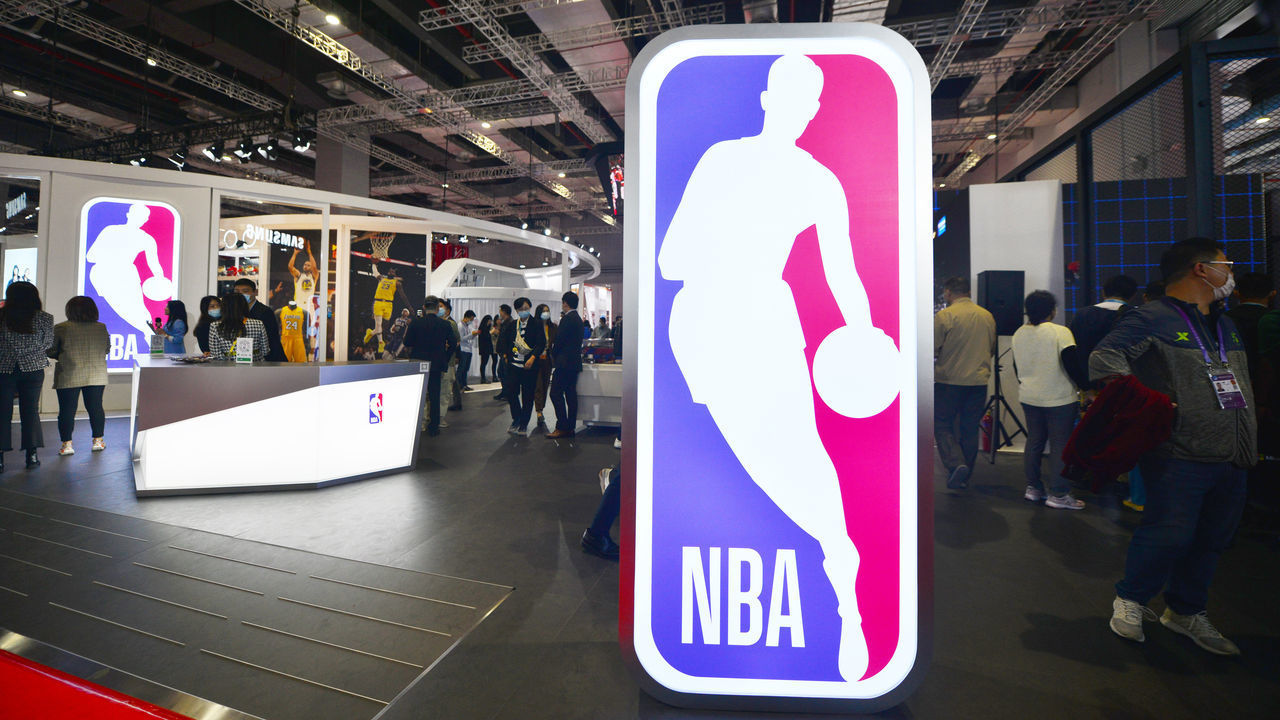SHANGHAI, CHINA - NOVEMBER 09: People visit the NBA stand during the 3rd China International Import Expo (CIIE) at the National Exhibition and Convention Center on November 9, 2020 in Shanghai, China.