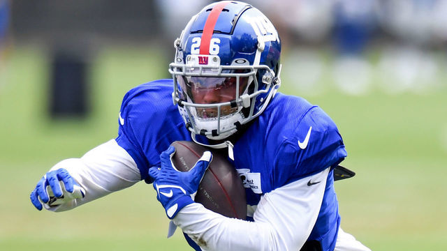 BEREA, OH - AUGUST 19: Running back Saquon Barkley #26 of the New York Giants runs a drill during a joint practice with the Cleveland Browns on August 19, 2021 in Berea, Ohio.