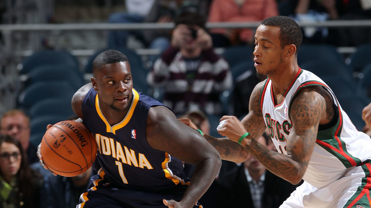 MILWAUKEE, WI - NOVEMBER 14: Lance Stephenson #1 of the Indiana Pacers posts up against Monta Ellis #11 of the Milwaukee Bucks during the NBA game on November 14, 2012 at the BMO Harris Bradley Center in Milwaukee, Wisconsin. NOTE TO USER: User expressly acknowledges and agrees that, by downloading and or using this Photograph, user is consenting to the terms and conditions of the Getty Images License Agreement. Mandatory Copyright Notice: Copyright 2012 NBAE