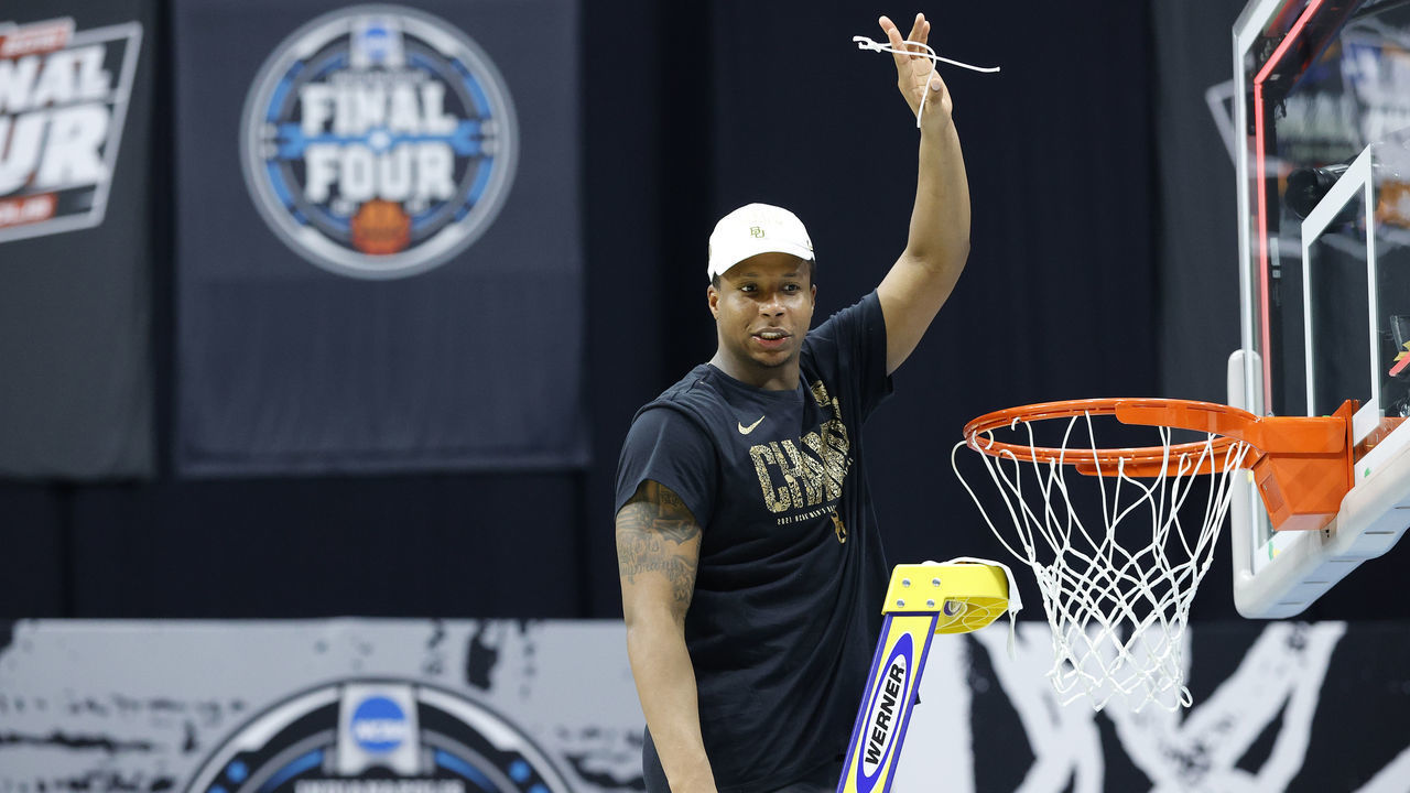 INDIANAPOLIS, INDIANA - APRIL 05: Mark Vital #11 of the Baylor Bears raises a piece of the net after winning the National Championship game of the 2021 NCAA Men's Basketball Tournament against the Gonzaga Bulldogs at Lucas Oil Stadium on April 05, 2021 in Indianapolis, Indiana. The Baylor Bears defeated the Gonzaga Bulldogs 86-70.