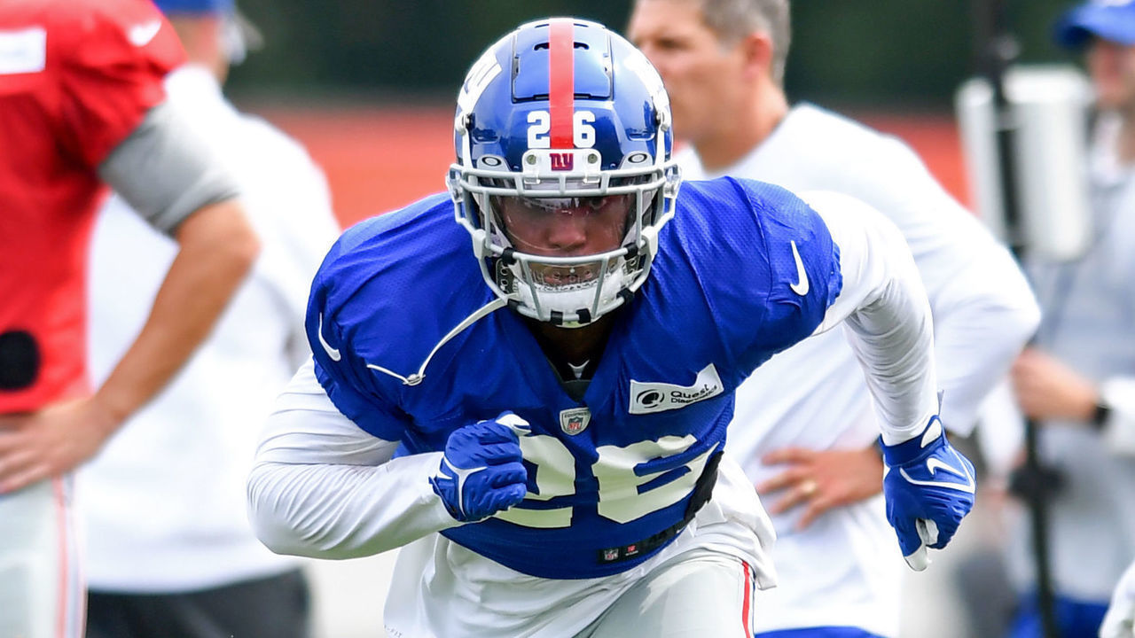 BEREA, OH - AUGUST 19: Running back Saquon Barkley #26 of the New York Giants runs a drill during a joint practice with the Cleveland Browns on August 19, 2021 in Berea, Ohio.