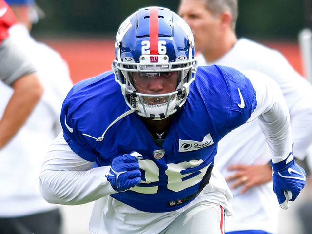 BEREA, OH - AUGUST 19: Running back Saquon Barkley #26 of the New York Giants runs a drill during a joint practice with the Cleveland Browns on August 19, 2021 in Berea, Ohio.