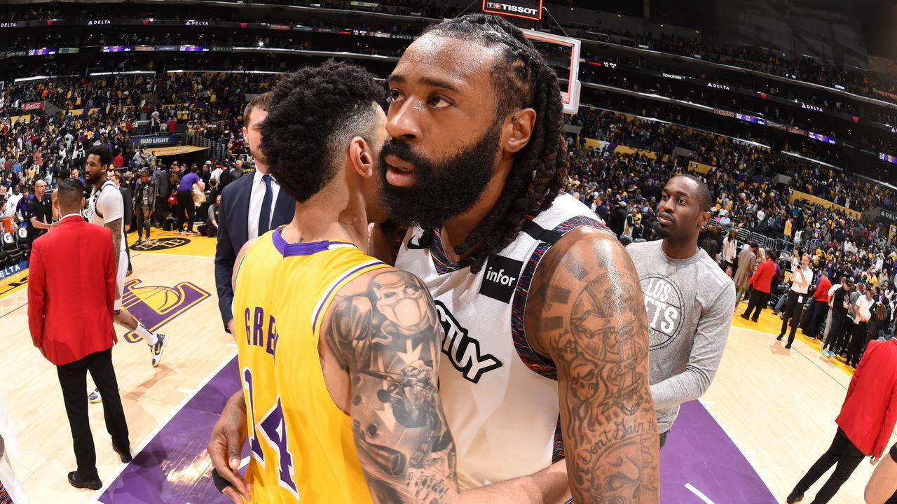 LOS ANGELES, CA - MARCH 10: Danny Green #14 of the Los Angeles Lakers hugs DeAndre Jordan #6 of the Brooklyn Nets after the game on March 10, 2020 at STAPLES Center in Los Angeles, California. NOTE TO USER: User expressly acknowledges and agrees that, by downloading and/or using this Photograph, user is consenting to the terms and conditions of the Getty Images License Agreement. Mandatory Copyright Notice: Copyright 2020 NBAE