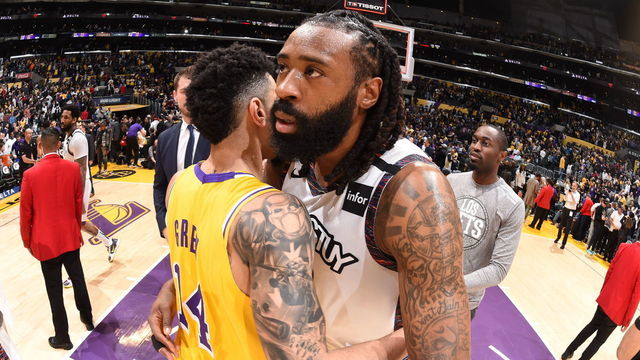 LOS ANGELES, CA - MARCH 10: Danny Green #14 of the Los Angeles Lakers hugs DeAndre Jordan #6 of the Brooklyn Nets after the game on March 10, 2020 at STAPLES Center in Los Angeles, California. NOTE TO USER: User expressly acknowledges and agrees that, by downloading and/or using this Photograph, user is consenting to the terms and conditions of the Getty Images License Agreement. Mandatory Copyright Notice: Copyright 2020 NBAE