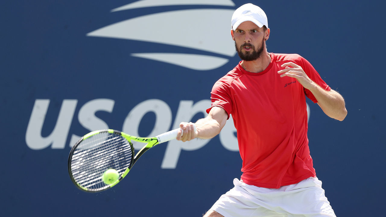 NEW YORK, NEW YORK - SEPTEMBER 04: Oscar Otte of Germany returns against Andreas Seppi of Italy during his Men's Singles third round match on Day Six of the 2021 US Open at the USTA Billie Jean King National Tennis Center on September 04, 2021 in the Flushing neighborhood of the Queens borough of New York City.