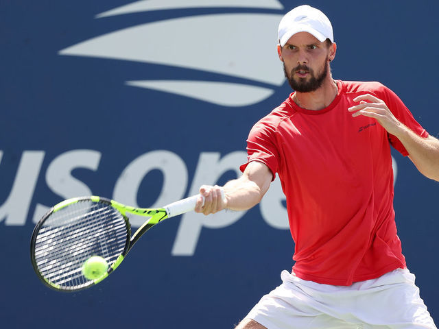 NEW YORK, NEW YORK - SEPTEMBER 04: Oscar Otte of Germany returns against Andreas Seppi of Italy during his Men's Singles third round match on Day Six of the 2021 US Open at the USTA Billie Jean King National Tennis Center on September 04, 2021 in the Flushing neighborhood of the Queens borough of New York City.
