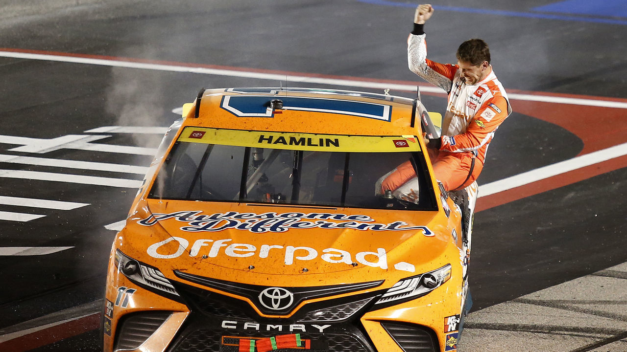 DARLINGTON, SOUTH CAROLINA - SEPTEMBER 05: Denny Hamlin, driver of the #11 Offerpad Toyota, celebrates after winning the NASCAR Cup Series Cook Out Southern 500 at Darlington Raceway on September 05, 2021 in Darlington, South Carolina.
