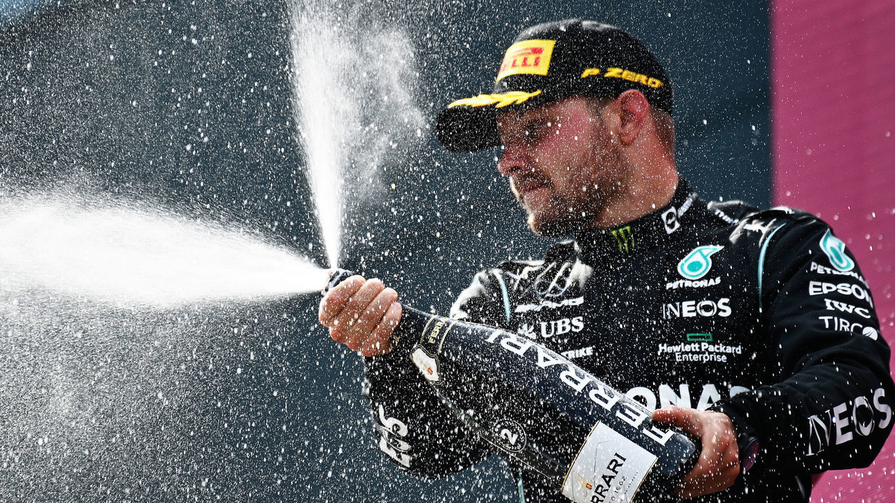 SPIELBERG, AUSTRIA - JULY 04: Second placed Valtteri Bottas of Finland and Mercedes GP celebrates on the podium during the F1 Grand Prix of Austria at Red Bull Ring on July 04, 2021 in Spielberg, Austria.