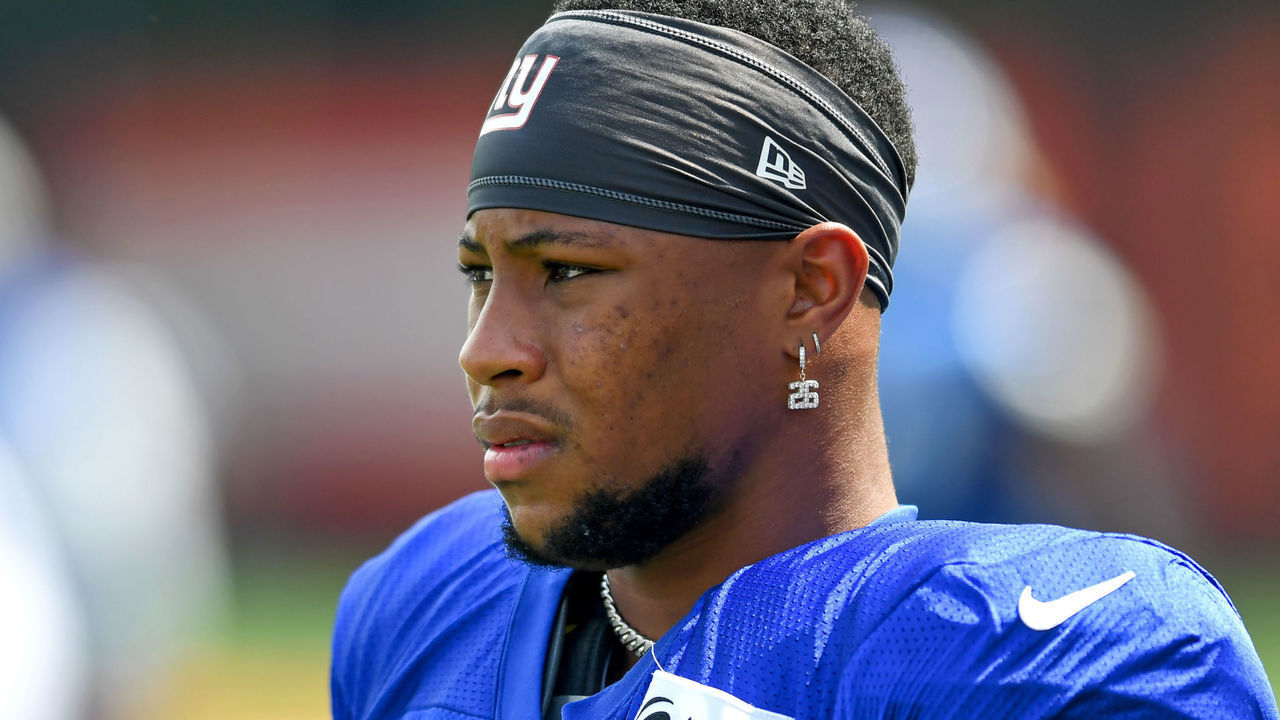 BEREA, OH - AUGUST 19: Saquon Barkley #26 of the New York Giants looks on during a joint practice with the Cleveland Browns on August 19, 2021 in Berea, Ohio.