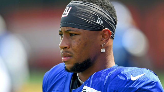 BEREA, OH - AUGUST 19: Saquon Barkley #26 of the New York Giants looks on during a joint practice with the Cleveland Browns on August 19, 2021 in Berea, Ohio.