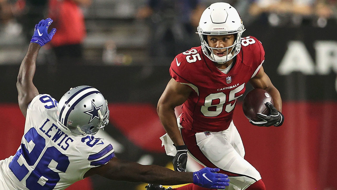 GLENDALE, ARIZONA - AUGUST 13: Wide receiver Rondale Moore #85 of the Arizona Cardinals runs with football after a reception past cornerback Jourdan Lewis #26 of the Dallas Cowboys during the first half of the NFL preseason game at State Farm Stadium on August 13, 2021 in Glendale, Arizona.