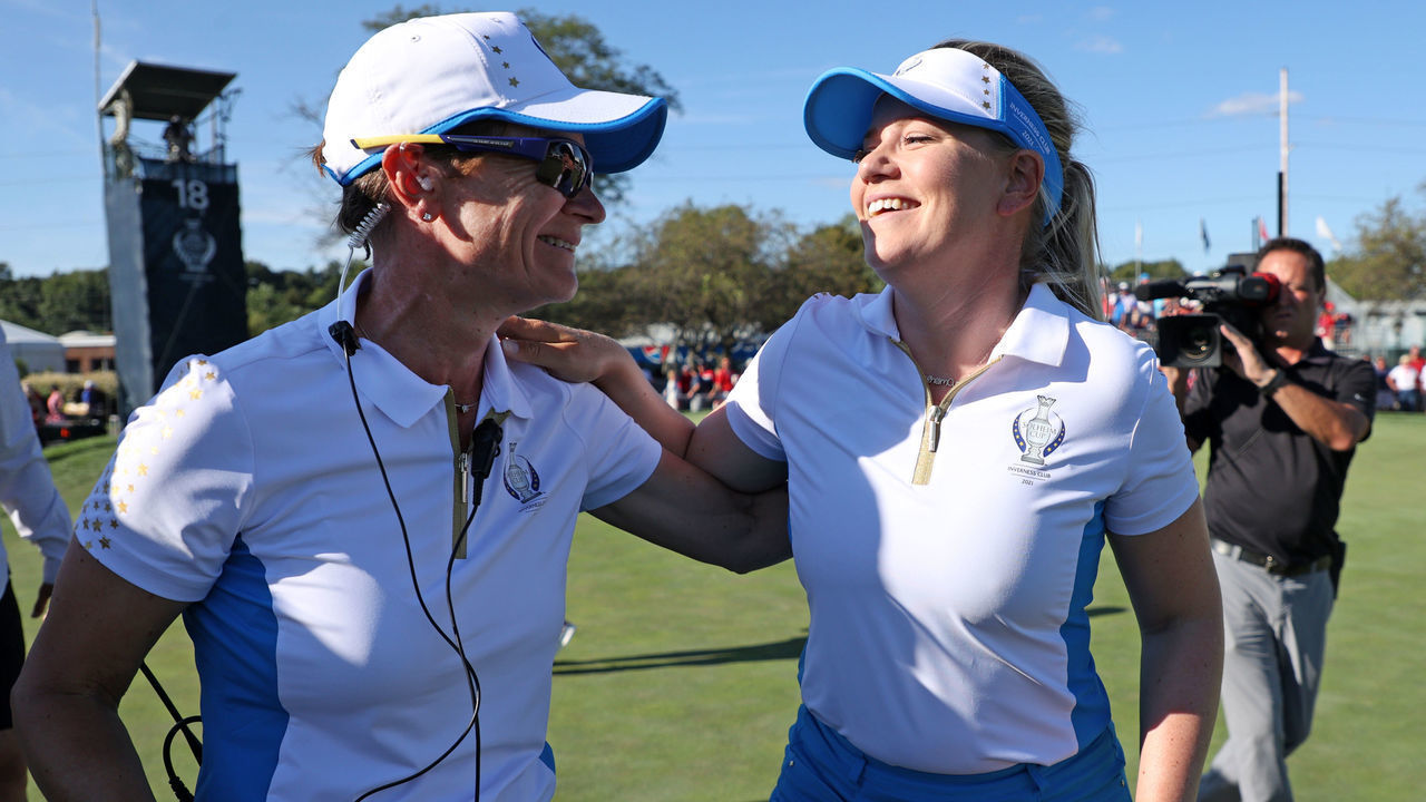 TOLEDO, OHIO - SEPTEMBER 06: Matilda Castren of Team Europe hugs Team Europe Captain Catriona Matthew after winning during the Singles Match on day three of the Solheim Cup at the Inverness Club on September 06, 2021 in Toledo, Ohio.