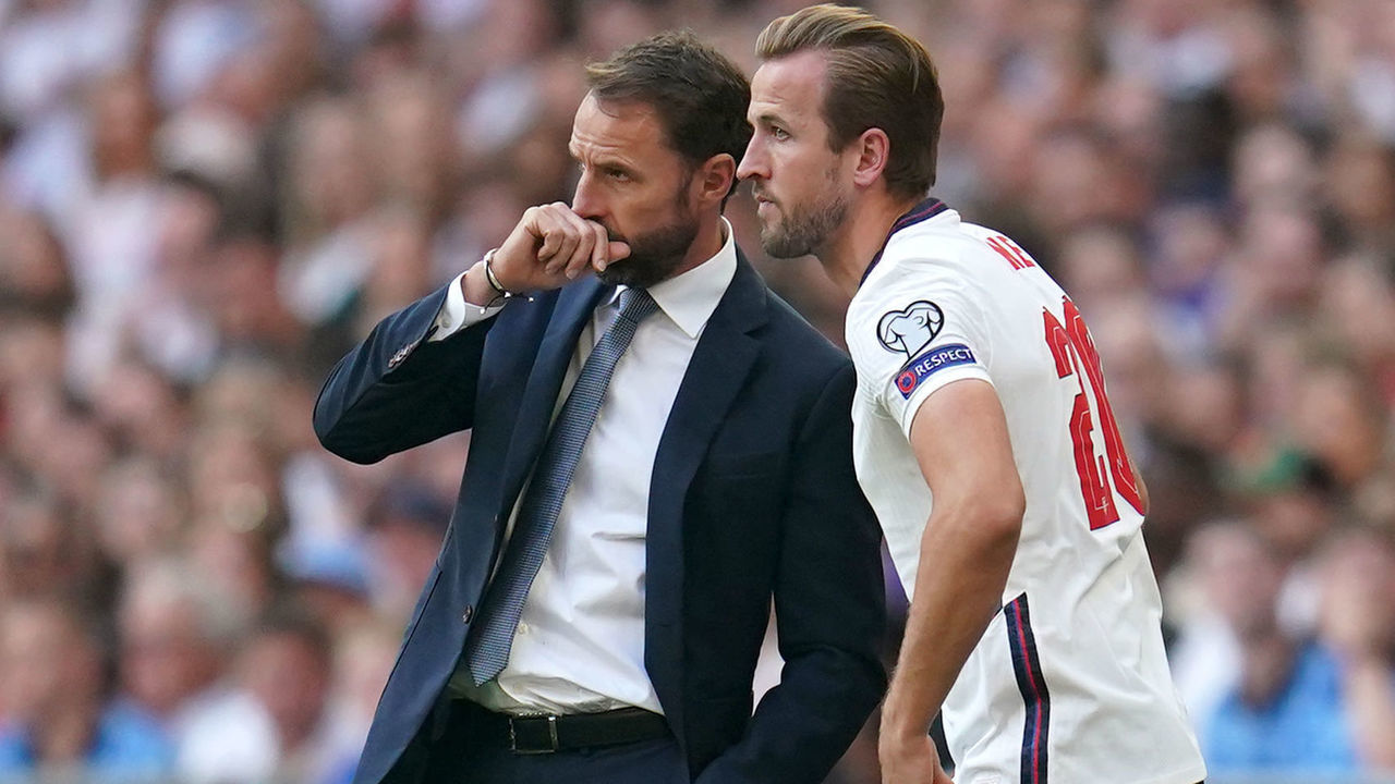 England's Gareth Southgate speaks with substitute Harry Kane on the touchline during the 2022 FIFA World Cup Qualifying match at Wembley Stadium, London. Picture date: Sunday September 5, 2021.