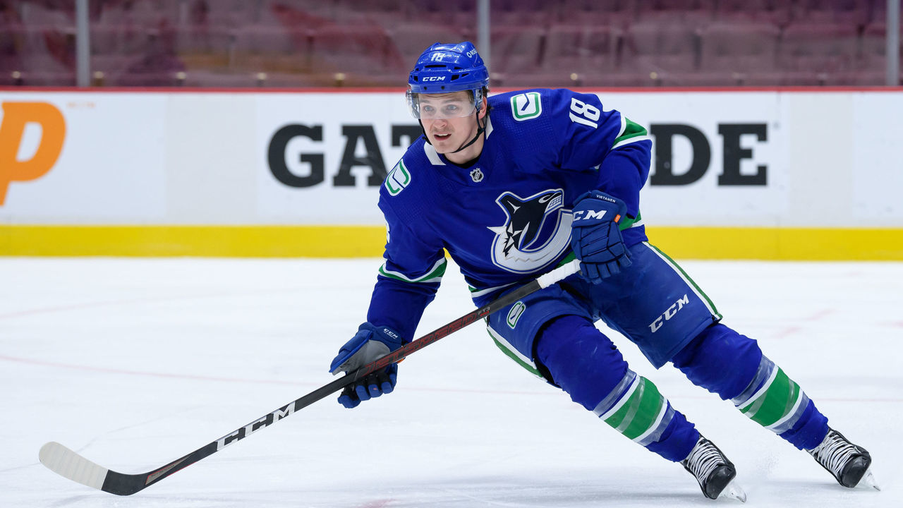 VANCOUVER, BC - MARCH 08: Vancouver Canucks right Wing Jake Virtanen (18) skates up ice during their NHL game against the Montreal Canadiens at Rogers Arena on March 8, 2021 in Vancouver, British Columbia, Canada.