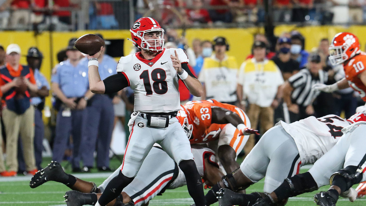 CHARLOTTE, NC - SEPTEMBER 04: JT Daniels (18) quarterback of Georgia looks to throw a pass during the Duke's Mayo Classic college football game between the Georgia Bulldogs and the Clemson Tiger on September 4, 2012, at Bank of America Stadium in Charlotte, N.C.