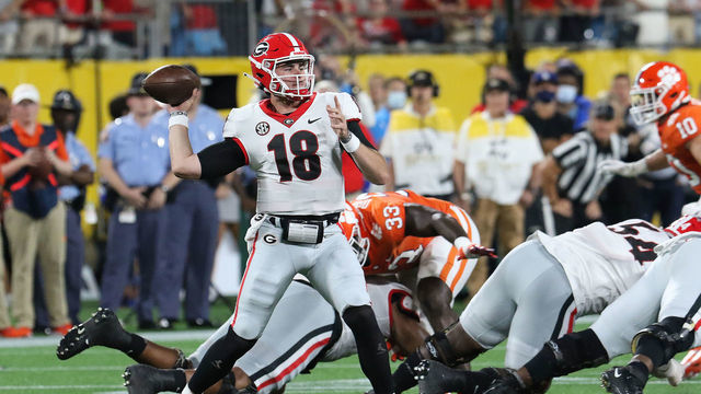 CHARLOTTE, NC - SEPTEMBER 04: JT Daniels (18) quarterback of Georgia looks to throw a pass during the Duke's Mayo Classic college football game between the Georgia Bulldogs and the Clemson Tiger on September 4, 2012, at Bank of America Stadium in Charlotte, N.C.