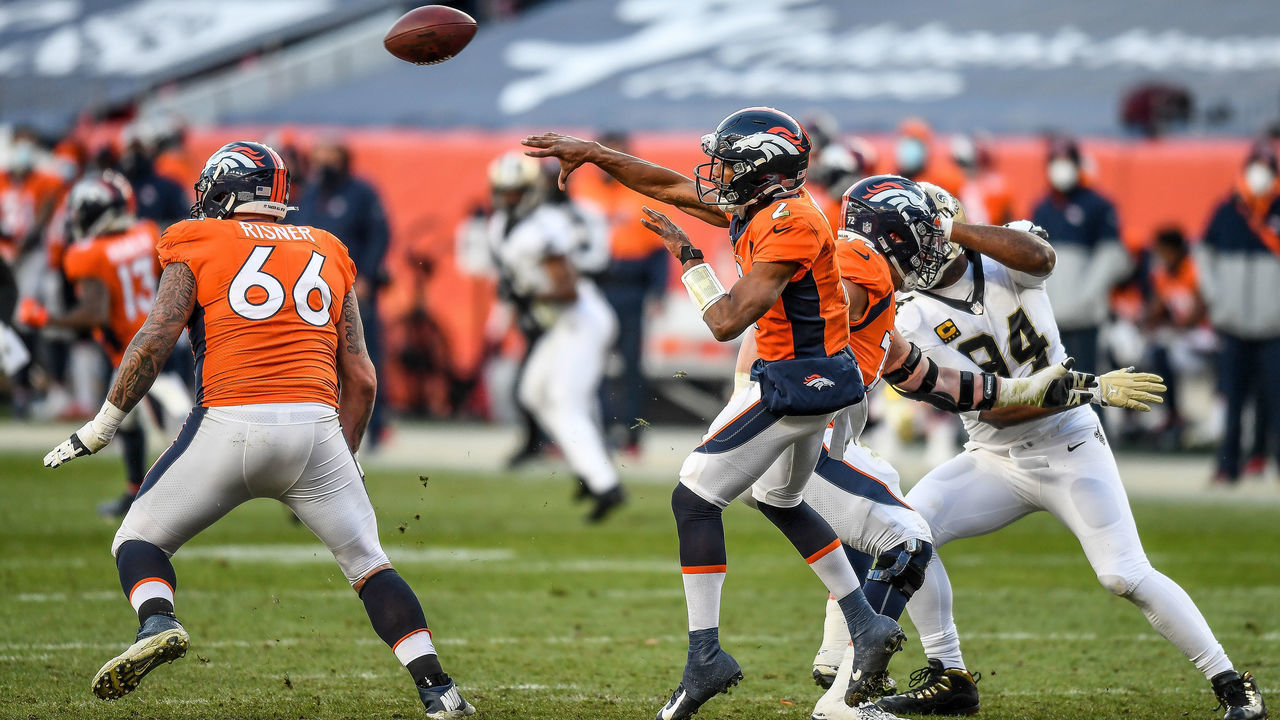DENVER, CO - NOVEMBER 29: Denver Broncos quarterback Kendall Hinton (2) completes a pass during a game between the Denver Broncos and the New Orleans Saints at Empower Field at Mile High on November 29, 2020 in Denver, Colorado.