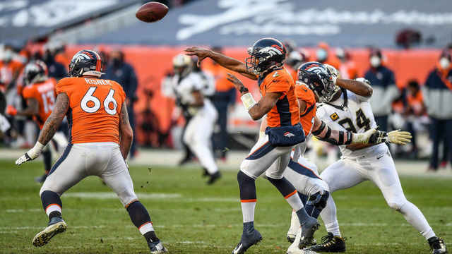 DENVER, CO - NOVEMBER 29: Denver Broncos quarterback Kendall Hinton (2) completes a pass during a game between the Denver Broncos and the New Orleans Saints at Empower Field at Mile High on November 29, 2020 in Denver, Colorado.