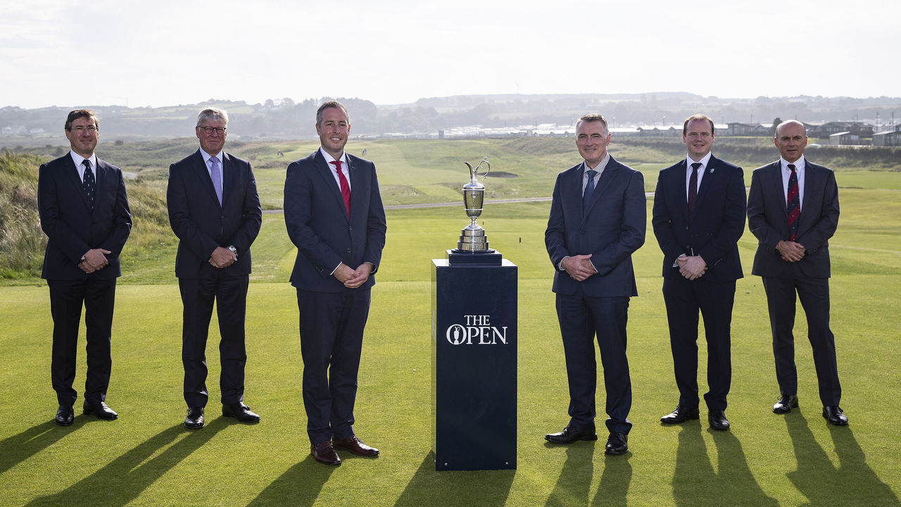 Pictured (from left) with the Claret Jug on the 1st tee box at Royal Portrush Golf Club ahead of the announcement that the 153rd Open championship will take place at the course as The Open championship is returning to Royal Portrush golf club in 2025 are David Meacher, Chairman Professional Championships Committee of the R&A, Martin Slumbers, Chief Executive of the R&A, Paul Givan, Northern Ireland First Minister, Declan Kearney, MLA NI Junior Minister, Gordon Lyons, MLA NI Minister for the Economy, and Dr Ian Kerr, Captain of Royal Portrush. Picture date: Wednesday September 8, 2021.