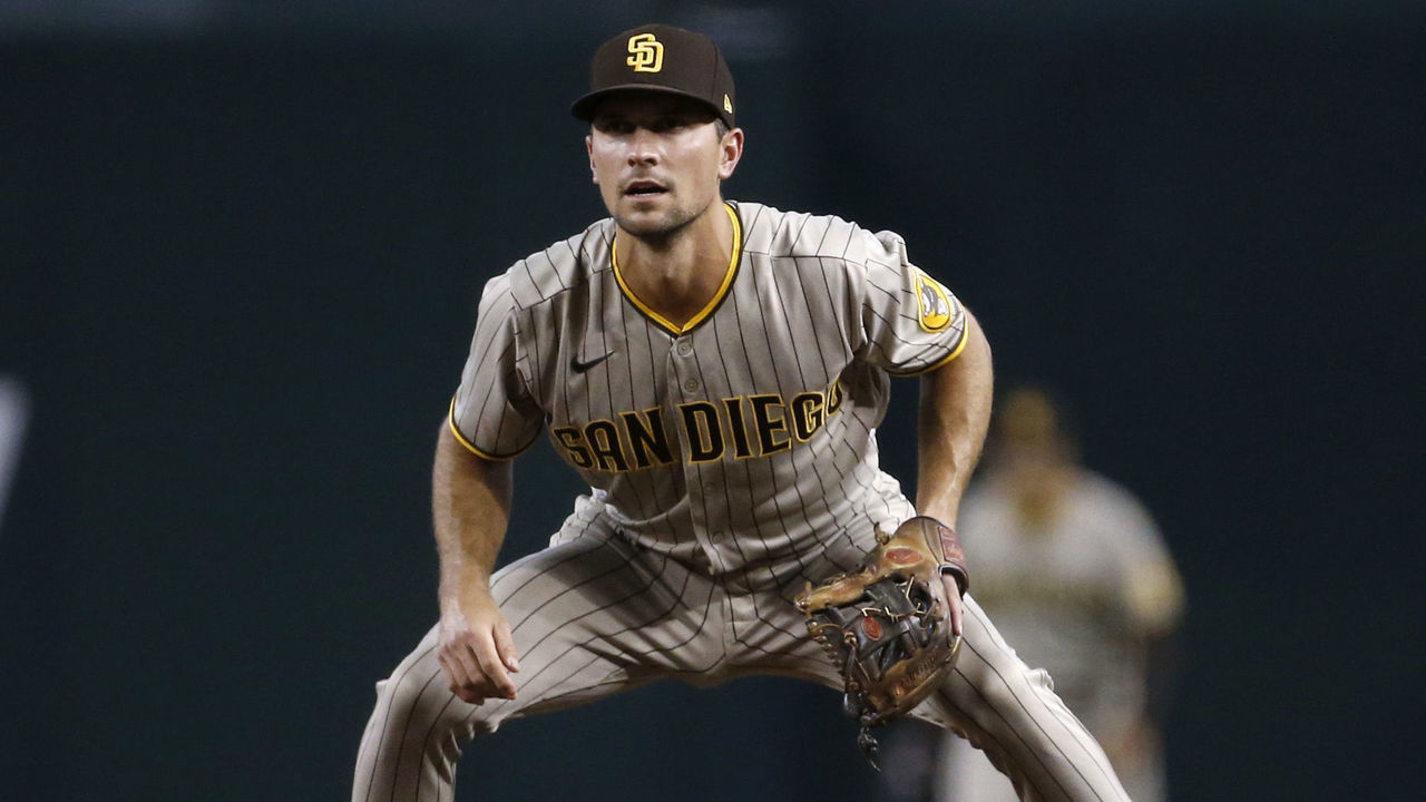 PHOENIX, ARIZONA - AUGUST 12: Second baseman Adam Frazier #12 of the San Diego Padres during the first inning of the MLB game against the Arizona Diamondbacks at Chase Field on August 12, 2021 in Phoenix, Arizona.