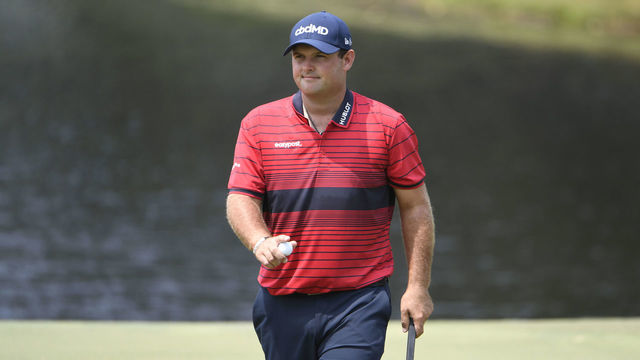 MEMPHIS, TN - AUGUST 08: Patrick Reed at the ninth green does a ball wave during the final round of the World Golf Championships-FedEx St. Jude Invitational at TPC Southwind on August 8, 2021 in Memphis, Tennessee.