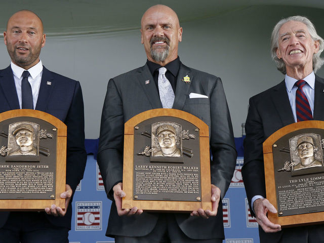 COOPERSTOWN, NEW YORK - SEPTEMBER 08: Derek Jeter, Larry Walker and Ted Simmons pose for a photograph with their plaques during the Baseball Hall of Fame induction ceremony at Clark Sports Center on September 08, 2021 in Cooperstown, New York.