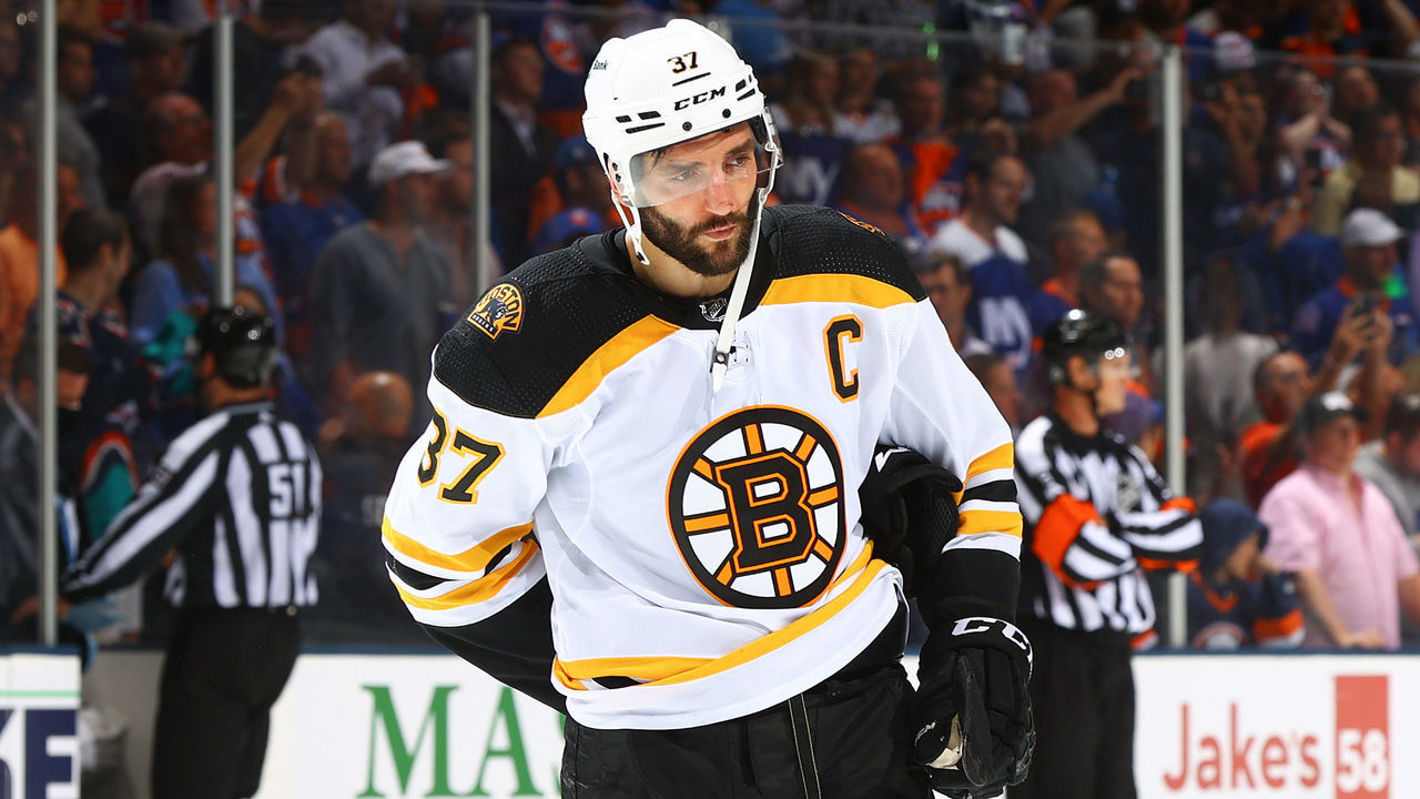 UNIONDALE, NEW YORK - JUNE 09: Patrice Bergeron #37 of the Boston Bruins skates off the ice after his teams 6-2 loss to the New York Islanders in Game Six of the Second Round of the 2021 Stanley Cup Playoffs at Nassau Coliseum on June 09, 2021 in Uniondale, New York.