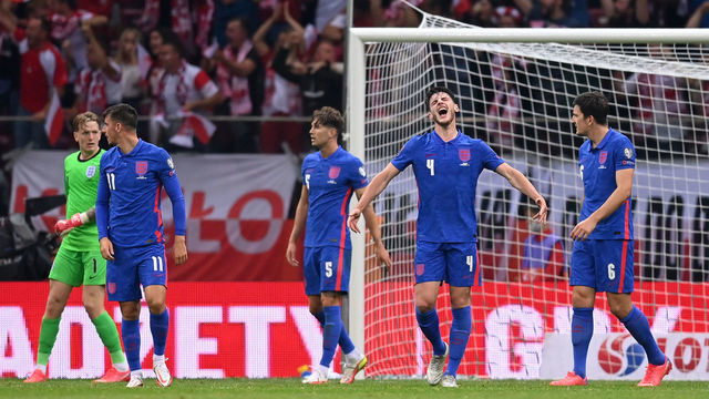 WARSAW, POLAND - SEPTEMBER 08: Mason Mount, Jordan Pickford, John Stones, Declan Rice and Harry Maguire of England look dejected after conceding a late goal during the 2022 FIFA World Cup Qualifier match between Poland and England at Stadion Narodowy on September 08, 2021 in Warsaw, Poland.