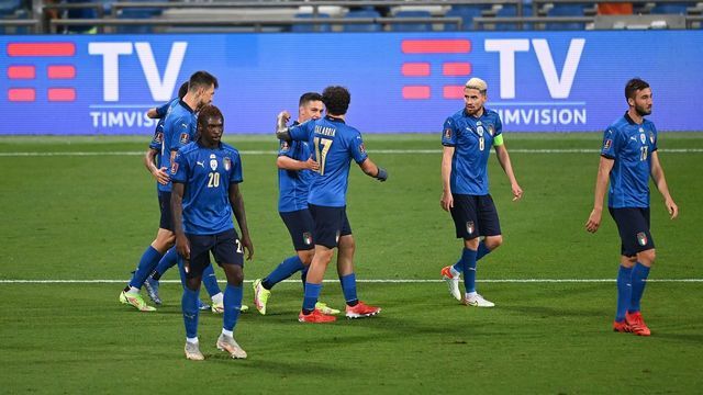 REGGIO NELL'EMILIA, ITALY - SEPTEMBER 08: Giovanni Di Lorenzo of Italy scores his team fifth goal during the 2022 FIFA World Cup Qualifier match between Italy and Lithuania at Mapei Stadium - Citta' del Tricolore on September 08, 2021 in Reggio nell'Emilia, .