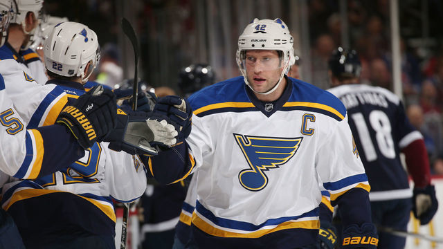 DENVER, CO - APRIL 3: David Backes #42 of the St. Louis Blues celebrates a goal against the Colorado Avalanche with his bench at the Pepsi Center on April 03, 2016 in Denver, Colorado.