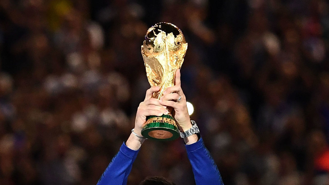 France's goalkeeper Hugo Lloris holds the 2018 World Cup trophy during a ceremony to celebrate the victory of the 2018 World Cup before doing a lap of honour at the end of the UEFA Nations League football match between France and Netherlands at the Stade de France stadium, in Saint-Denis, northern of Paris, on September 9, 2018.