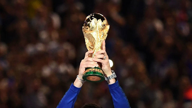 France's goalkeeper Hugo Lloris holds the 2018 World Cup trophy during a ceremony to celebrate the victory of the 2018 World Cup before doing a lap of honour at the end of the UEFA Nations League football match between France and Netherlands at the Stade de France stadium, in Saint-Denis, northern of Paris, on September 9, 2018.
