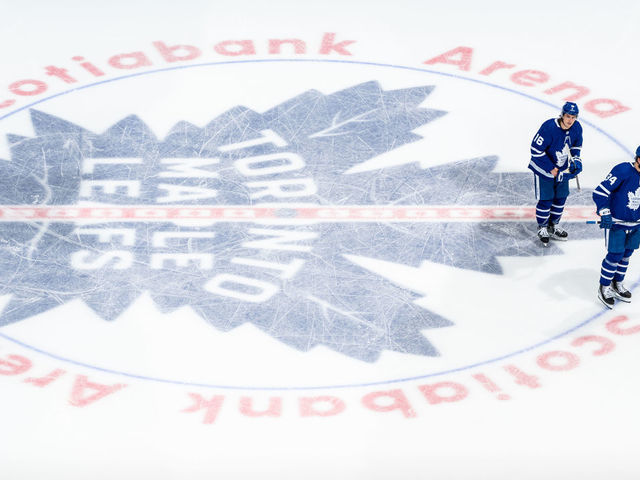 TORONTO, ON - MAY 8: Mitchell Marner #16 of the Toronto Maple Leafs and Auston Matthews #34 skate over the logo at centre ice at an NHL game against the Montreal Canadiens during the second period at the Scotiabank Arena on May 8, 2021 in Toronto, Ontario, Canada.