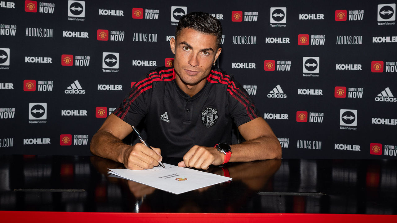 MANCHESTER, ENGLAND - SEPTEMBER 08: (EXCLUSIVE COVERAGE) Cristiano Ronaldo of Manchester United poses after signing his contract with the club at Carrington Training Ground on September 08, 2021 in Manchester, England.