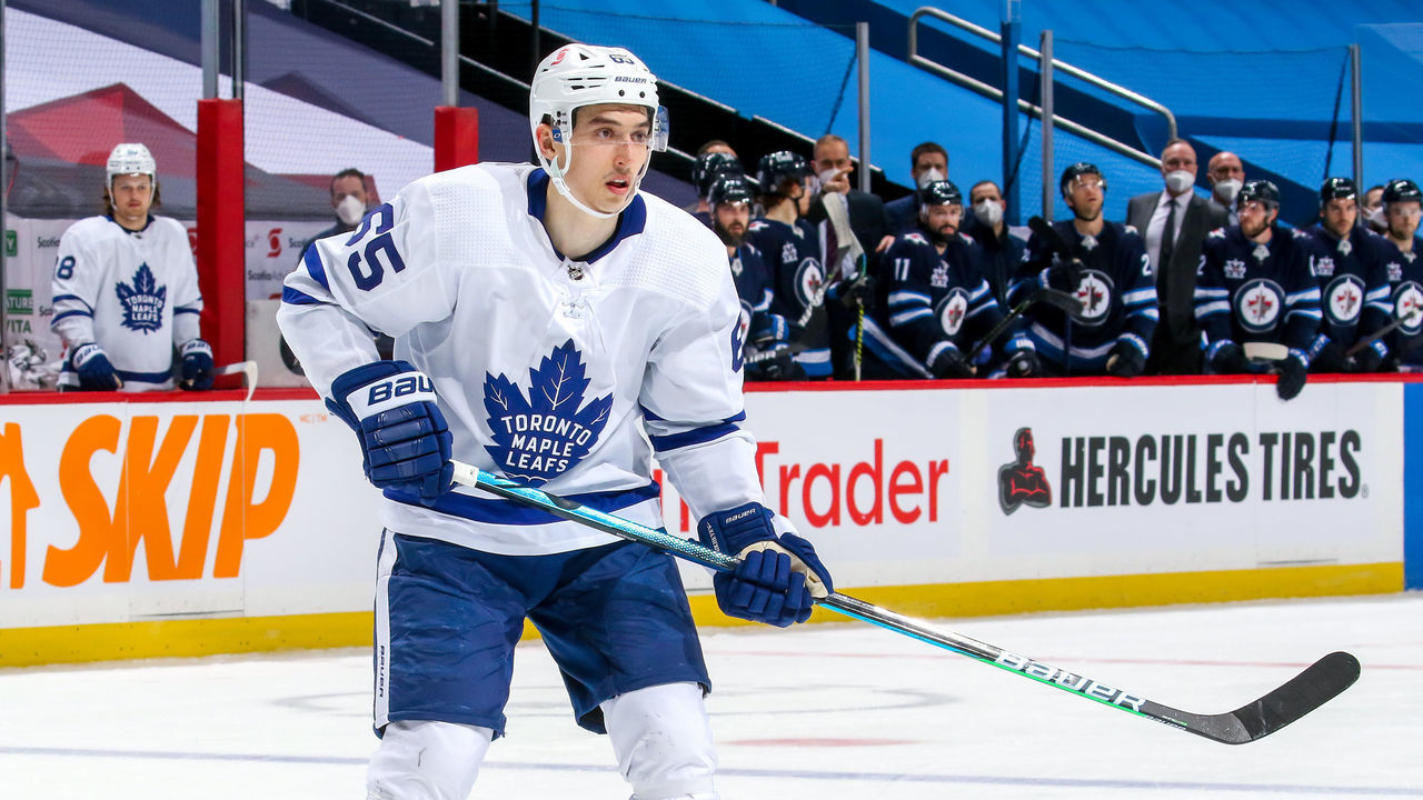 WINNIPEG, MB - APRIL 24: Ilya Mikheyev #65 of the Toronto Maple Leafs keeps an eye on the play during third period action against the Winnipeg Jets at Bell MTS Place on April 24, 2021 in Winnipeg, Manitoba.