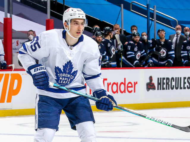 WINNIPEG, MB - APRIL 24: Ilya Mikheyev #65 of the Toronto Maple Leafs keeps an eye on the play during third period action against the Winnipeg Jets at Bell MTS Place on April 24, 2021 in Winnipeg, Manitoba.