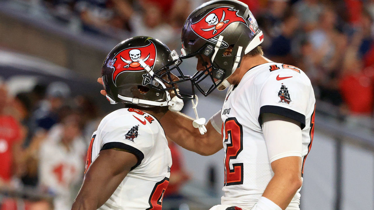 TAMPA, FLORIDA - SEPTEMBER 09: Antonio Brown #81 and Tom Brady #12 of the Tampa Bay Buccaneers celebrate their touchdown during the second quarter against the Dallas Cowboys at Raymond James Stadium on September 09, 2021 in Tampa, Florida.