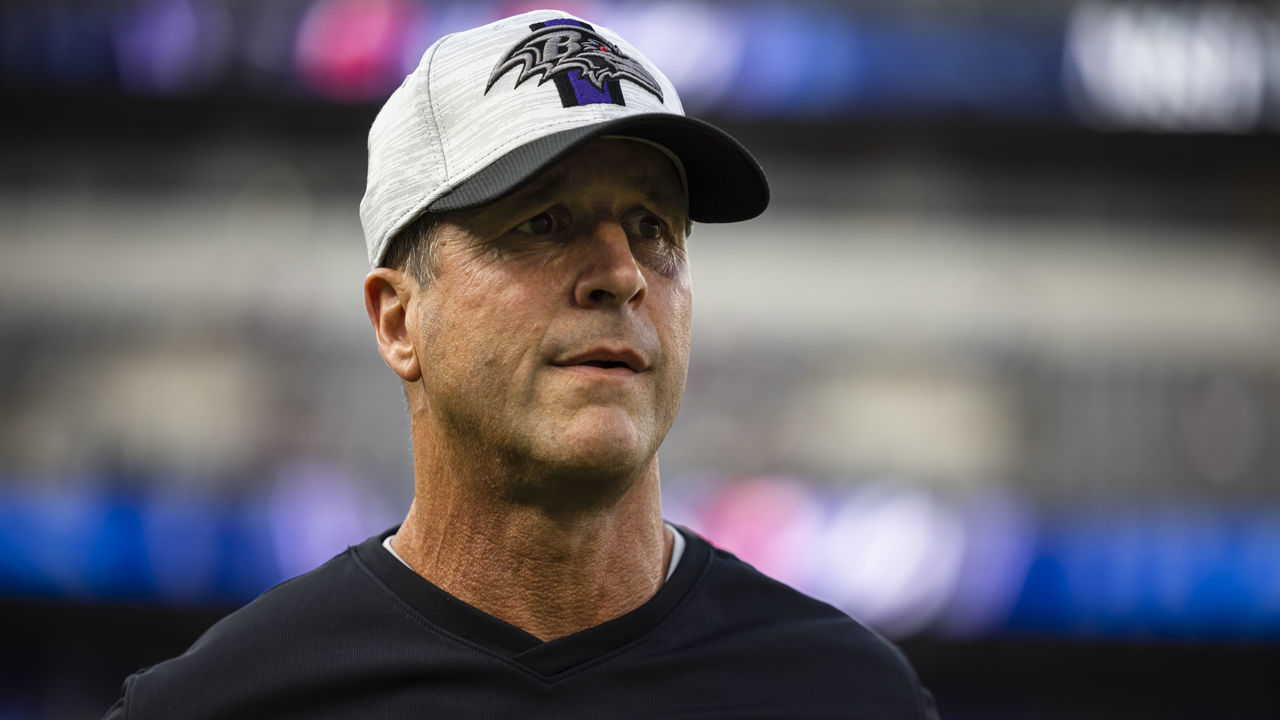 BALTIMORE, MD - AUGUST 14: Head coach John Harbaugh of the Baltimore Ravens looks on before a preseason game against the New Orleans Saints at M&T Bank Stadium on August 14, 2021 in Baltimore, Maryland.