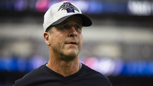 BALTIMORE, MD - AUGUST 14: Head coach John Harbaugh of the Baltimore Ravens looks on before a preseason game against the New Orleans Saints at M&T Bank Stadium on August 14, 2021 in Baltimore, Maryland.