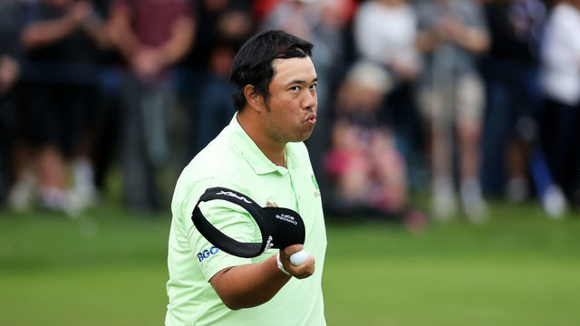 VIRGINIA WATER, ENGLAND - SEPTEMBER 10: Kiradech Aphibarnrat of Thailand acknowledges the crowd after finishing his round on the 18th hole during Day Two of The BMW PGA Championship at Wentworth Golf Club on September 10, 2021 in Virginia Water, England.