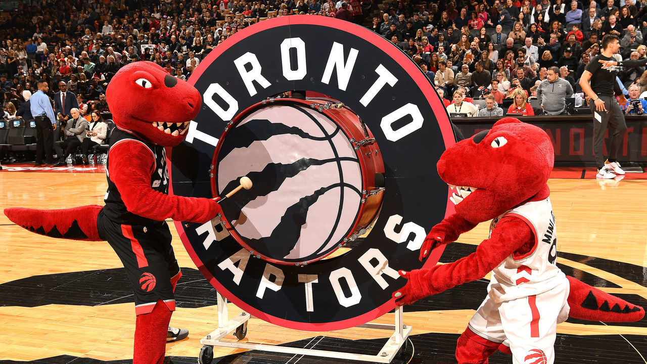 TORONTO, CANADA - FEBRUARY 28: The Toronto Raptors Mascots get the crowd hyped before the game against the Charlotte Hornets on February 28, 2020 at the Scotiabank Arena in Toronto, Ontario, Canada. Mandatory Copyright Notice: Copyright 2020 NBAE