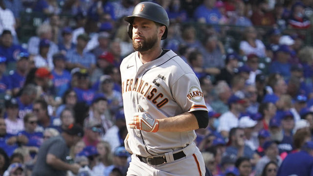 CHICAGO, ILLINOIS - SEPTEMBER 10: Brandon Belt #9 of the San Francisco Giants hits a two-run home run during the seventh inning of a game against the Chicago Cubs at Wrigley Field on September 10, 2021 in Chicago, Illinois. The Giants defeated the Cubs 6-1.