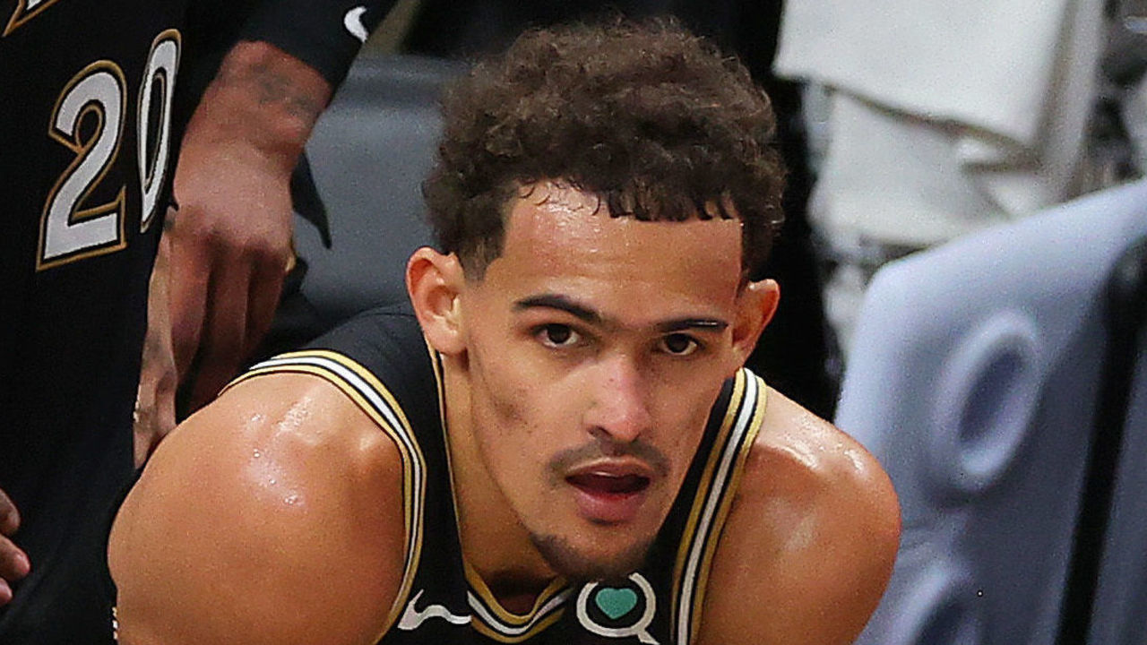 ATLANTA, GEORGIA - JULY 03: Trae Young #11 of the Atlanta Hawks look on in the final seconds of the team's series loss to the Milwaukee Bucks in Game Six of the Eastern Conference Finals at State Farm Arena on July 03, 2021 in Atlanta, Georgia
