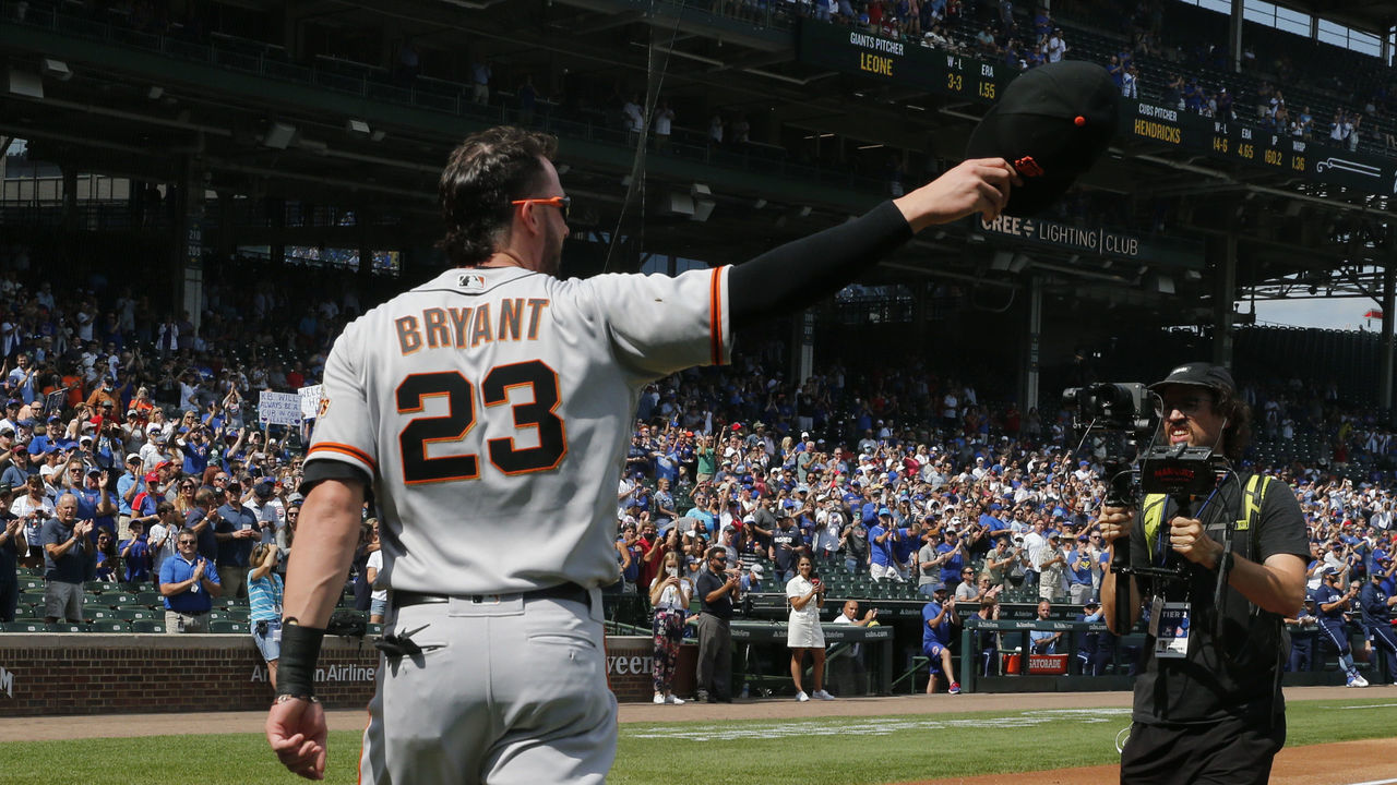 CHICAGO, ILLINOIS - SEPTEMBER 10: Kris Bryant #23 of the San Francisco Giants waves to the fans during a standing ovation following a video tribute in his honor prior to a game against the Chicago Cubs at Wrigley Field on September 10, 2021 in Chicago, Illinois. Today's game was Bryant's first time back at Wrigley Field since he was traded by the Cubs.