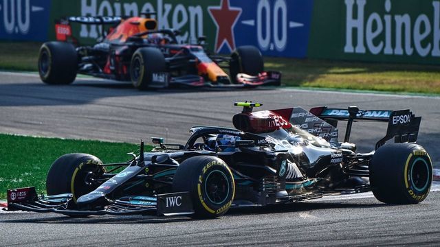 Mercedes' Finnish driver Valtteri Bottas drives ahead of Red Bull's Dutch driver Max Verstappen during the sprint session at the Autodromo Nazionale circuit in Monza, on September 11, 2021, ahead of the Italian Formula One Grand Prix.