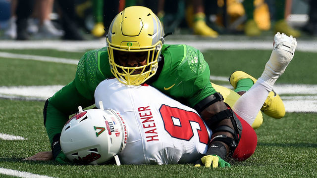 EUGENE, OREGON - SEPTEMBER 04: Defensive end Kayvon Thibodeaux #5 of the Oregon Duck sacks quarterback Jake Haener #9 of the Fresno State Bulldogs during the first quarter of the game at Autzen Stadium on September 04, 2021 in Eugene, Oregon. Oregon won 31-24.
