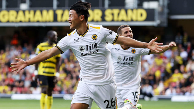 WATFORD, ENGLAND - SEPTEMBER 11: Hee-chan Hwang of Wolverhampton Wanderers celebrates after scoring his team's second goal during the Premier League match between Watford and Wolverhampton Wanderers at Vicarage Road on September 11, 2021 in Watford, England.