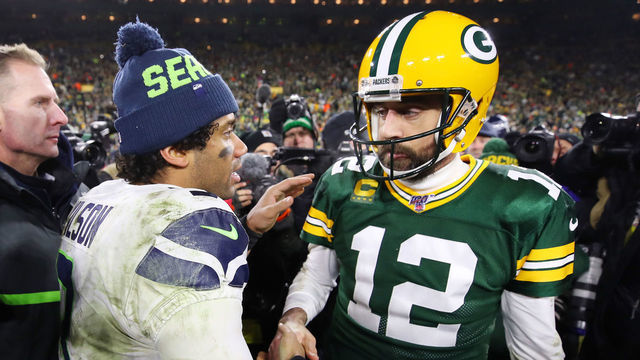 GREEN BAY, WISCONSIN - JANUARY 12: Russell Wilson #3 of the Seattle Seahawks greets Aaron Rodgers #12 of the Green Bay Packers after the Packers defeated the Seahawks 28-23 in the NFC Divisional Playoff game at Lambeau Field on January 12, 2020 in Green Bay, Wisconsin.