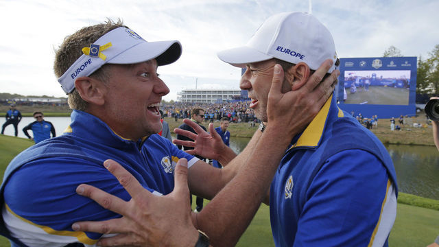 Ian Poulter and Sergio Garcia celebrate European victory on the 15th green during day three of the 2018 Ryder Cup at Le Golf National near Versailles on September 30th 2018 in France