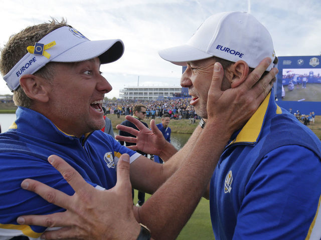 Ian Poulter and Sergio Garcia celebrate European victory on the 15th green during day three of the 2018 Ryder Cup at Le Golf National near Versailles on September 30th 2018 in France